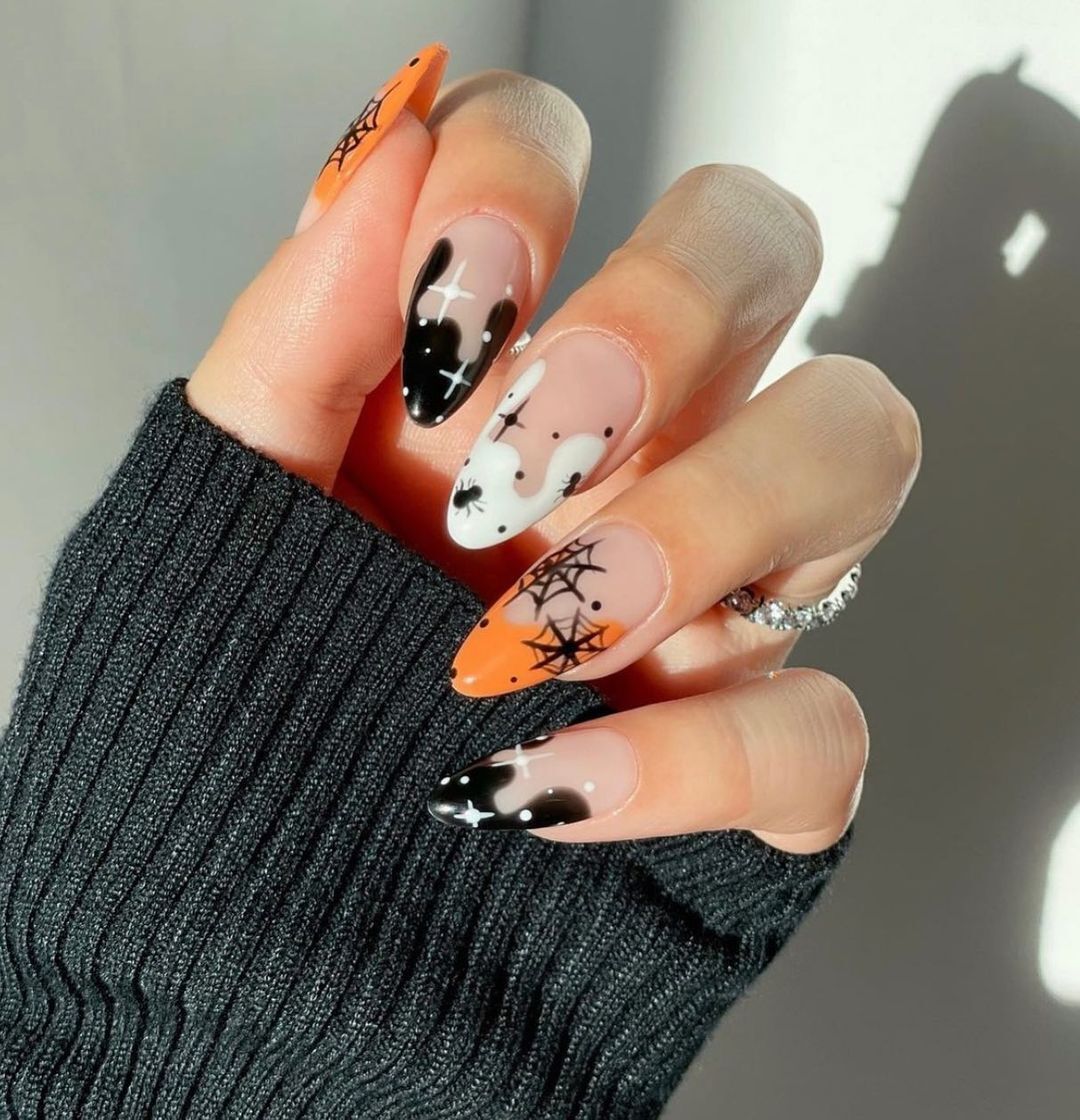 7 Hauntingly Gorgeous Halloween Nail Designs